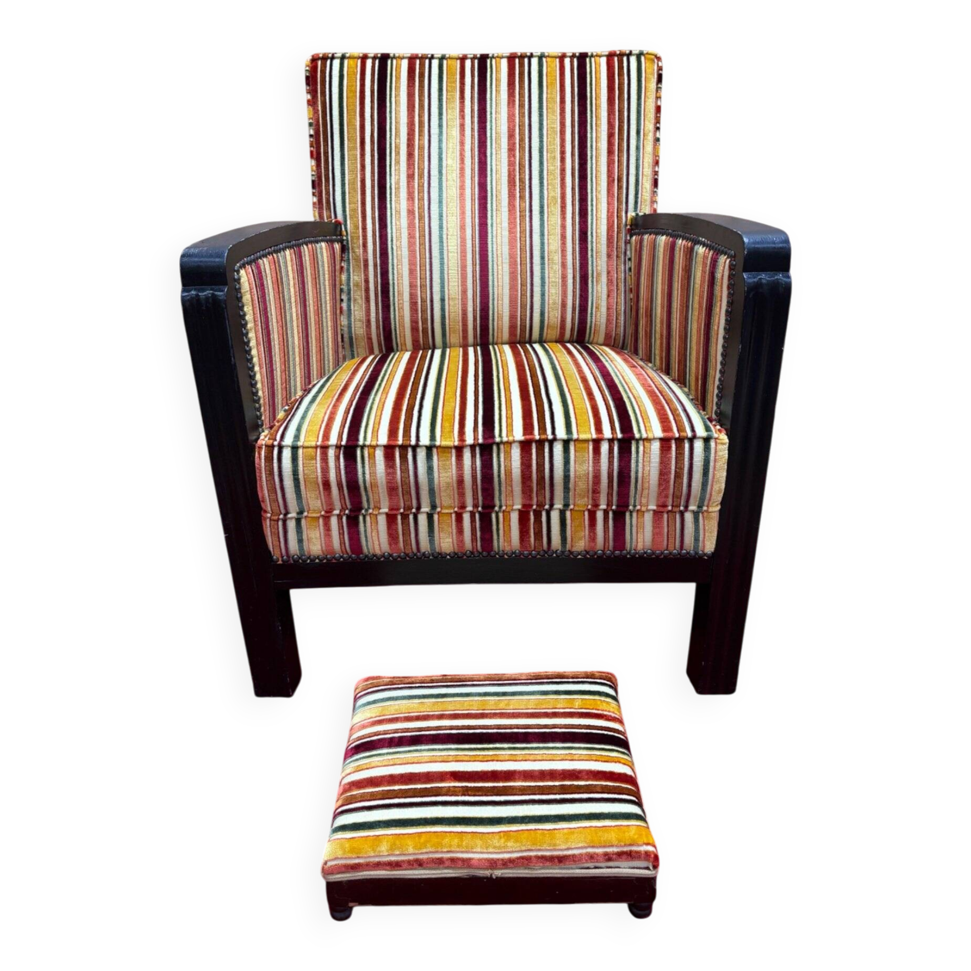 Art Deco armchair in multicolored striped fabric and its footrest