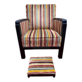 Art Deco armchair in multicolored striped fabric and its footrest