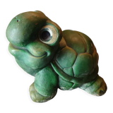 Green turtle in concrete