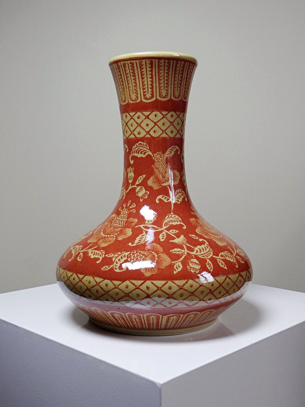 20th century Chinese vase, hand-painted ceramic in an unusual red hue.