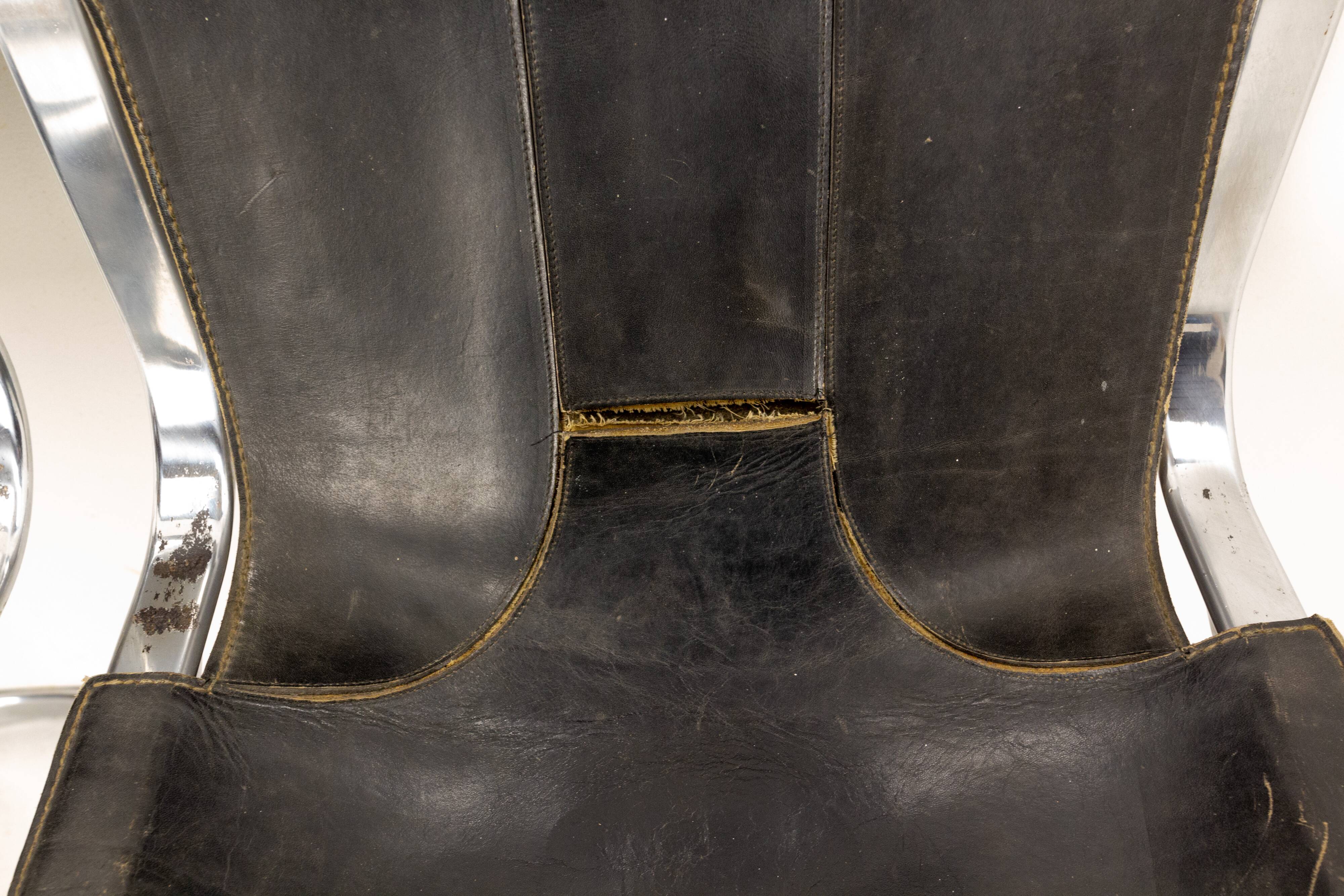 Pair of windmill leather chairs