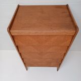 High wooden chest of drawers in the 50s