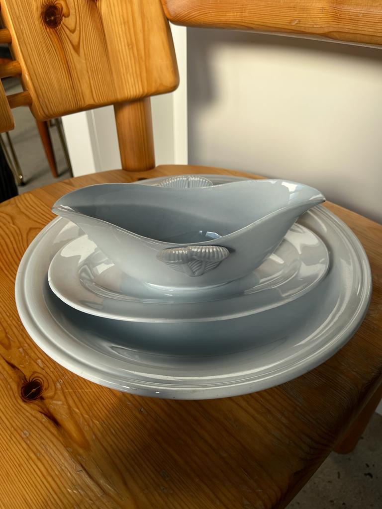 Flat set and light blue saucière earthenware from Montereau