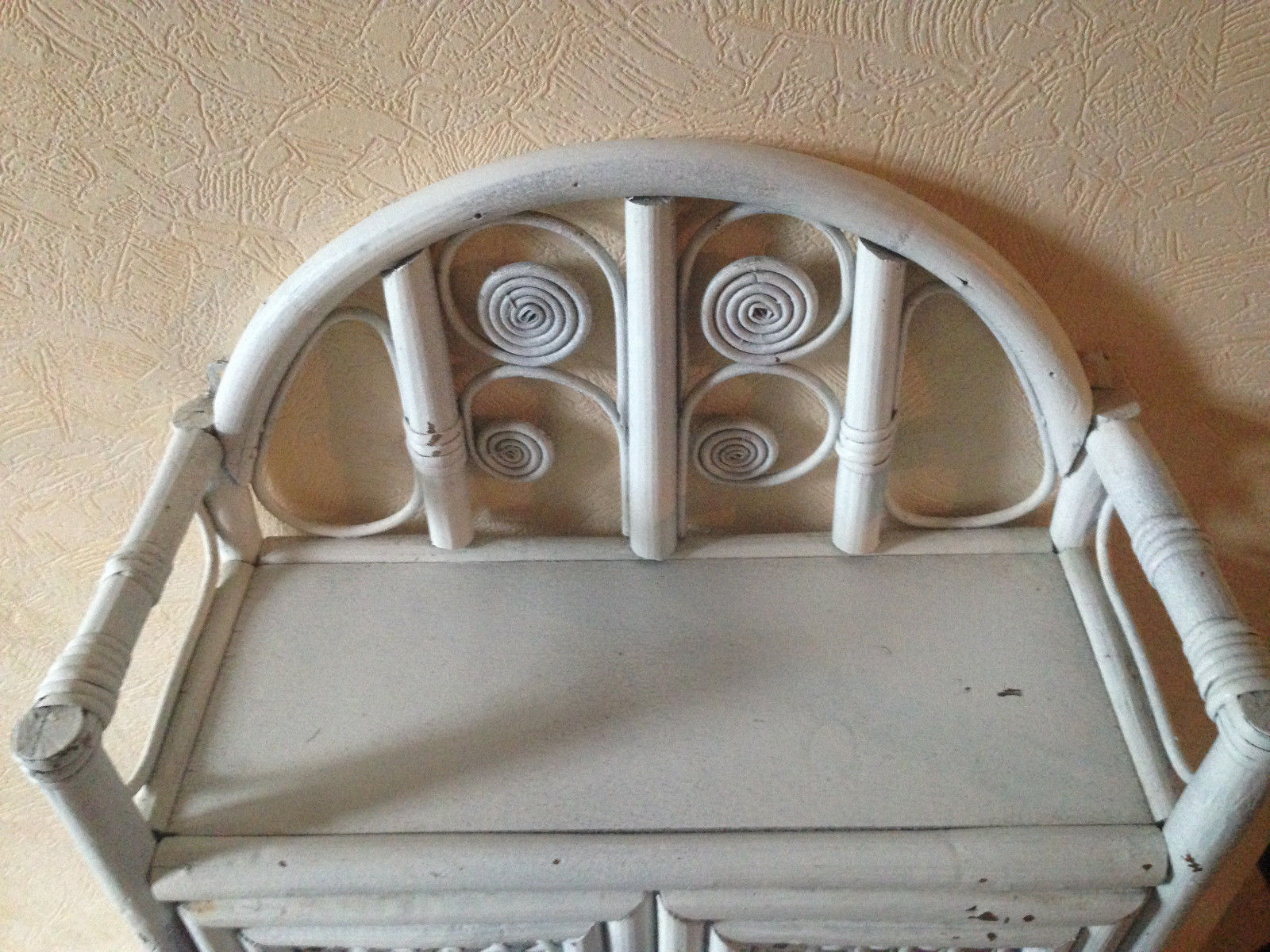 White rattan wall shelf