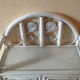 White rattan wall shelf