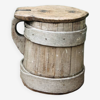 Old wooden mug, popular art