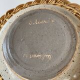 Wicker and ceramic piece signed, 1990s.