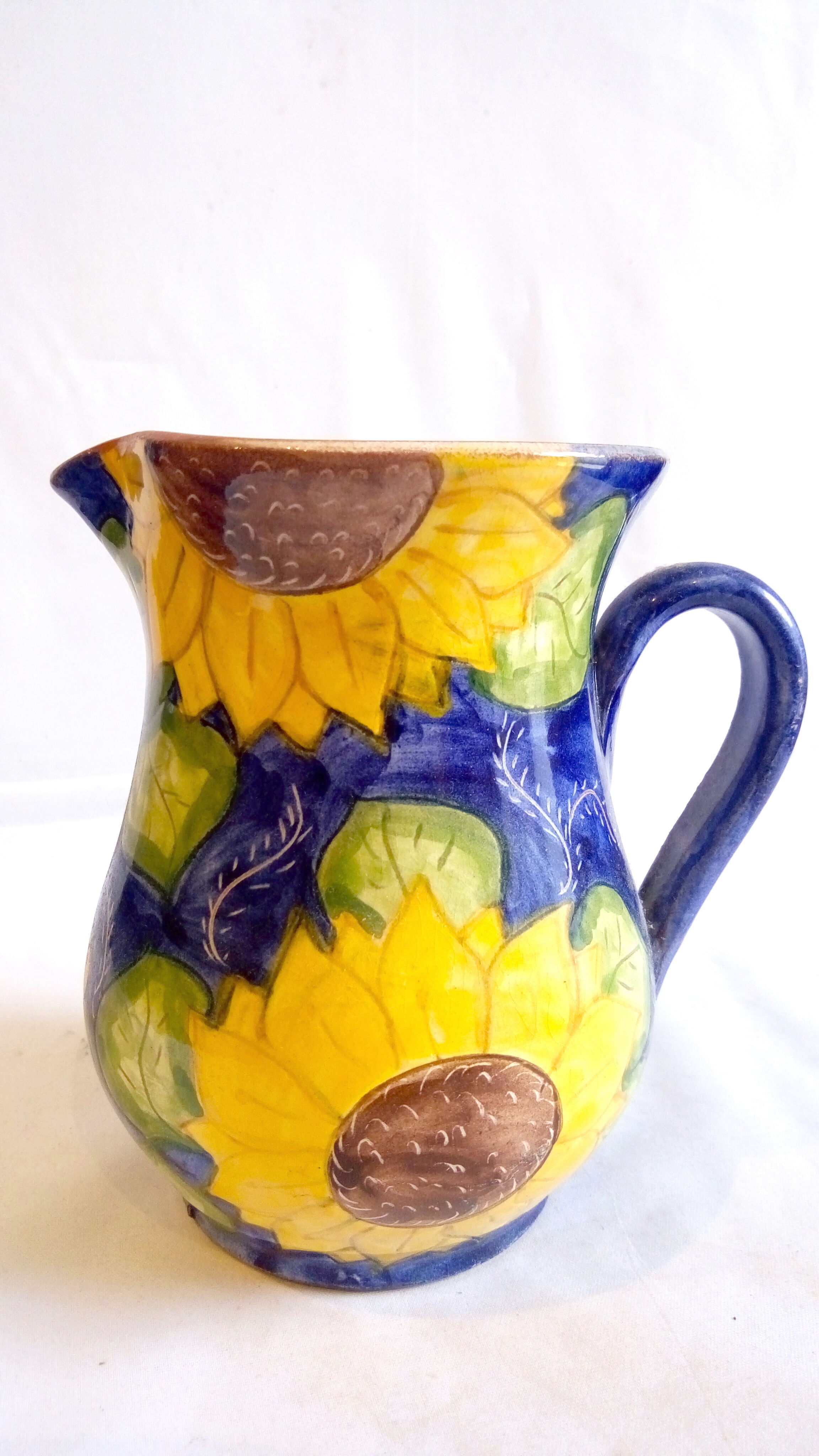 Portuguese pitcher with sunflowers