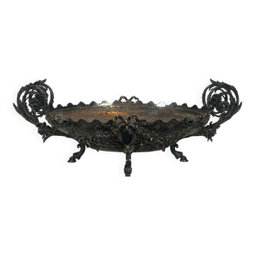 Especially a silver-plated metal table with engraving, signed.