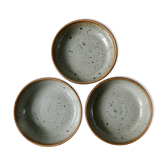 3 hollow sandstone plates signed Jean Louis Nigon