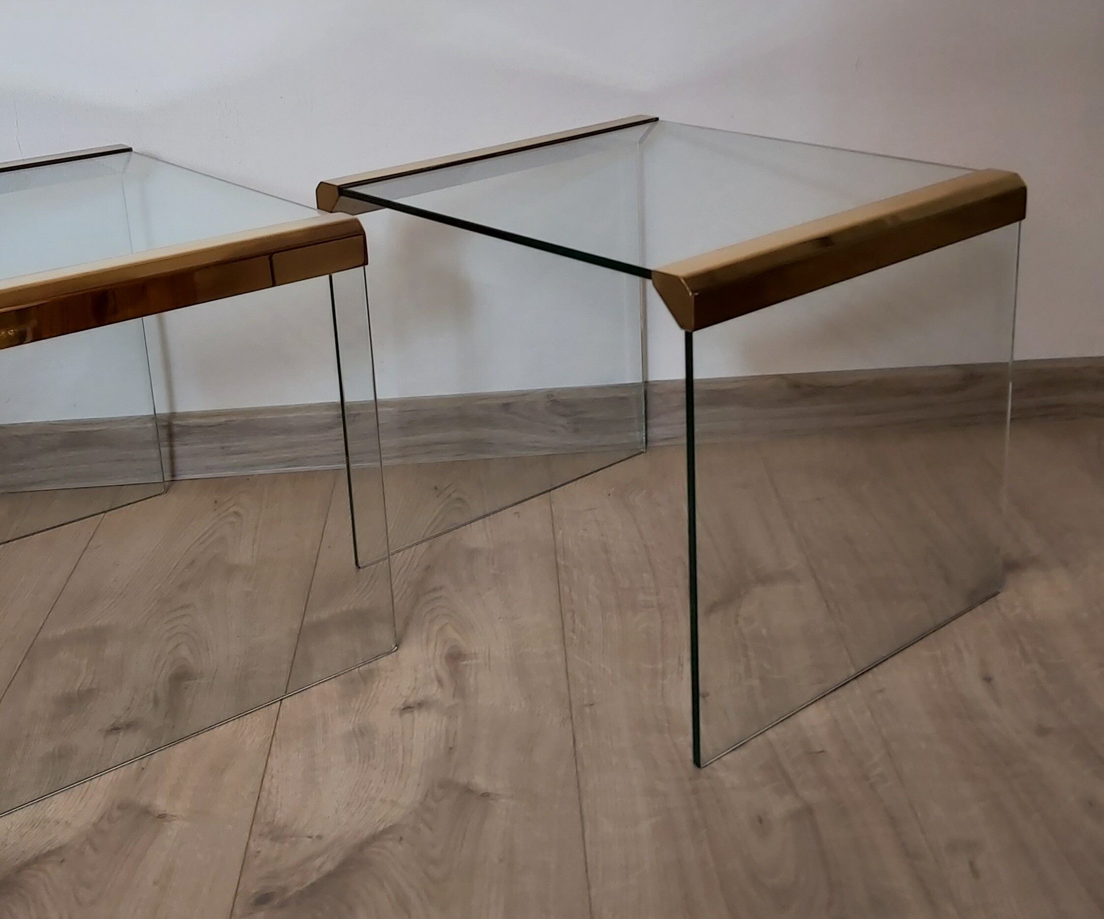 A pair of glass tables, designed by L. Rosen, Pace Collection, USA, 1970