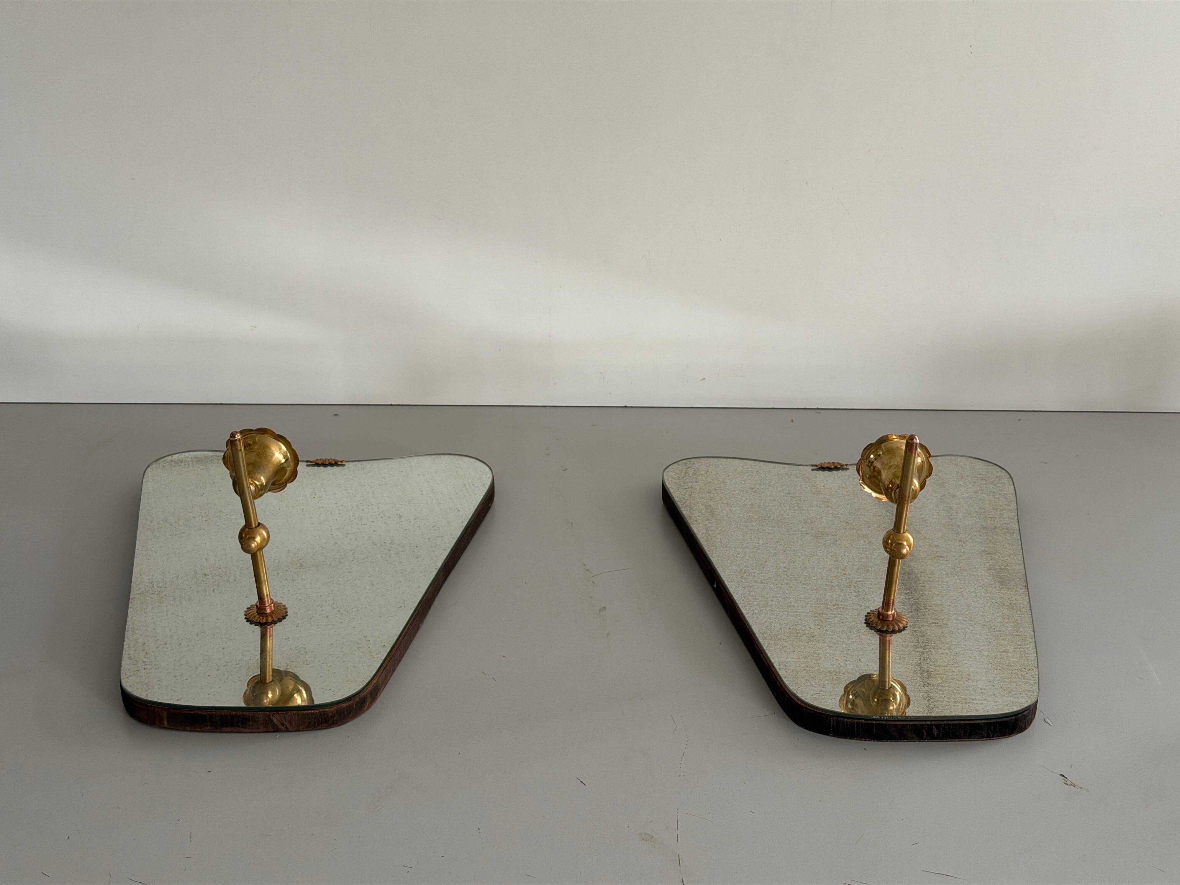 Pair of brass wall lights with mirrors, mid-20th century, Italy, 1960.