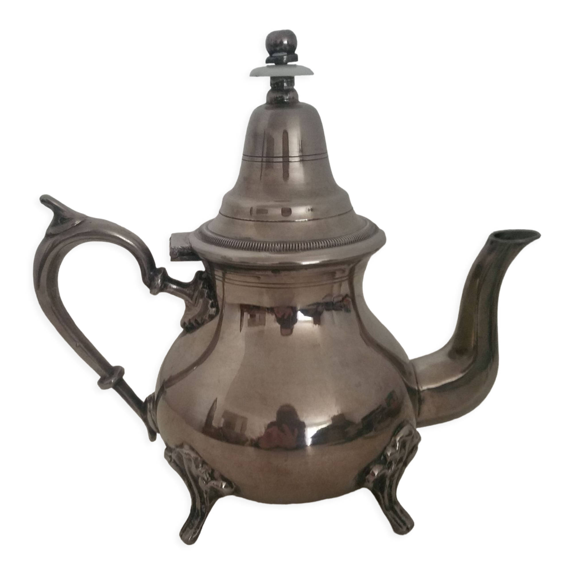 Oriental teapot in silver metal