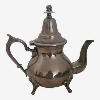 Oriental teapot in silver metal