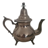 Oriental teapot in silver metal