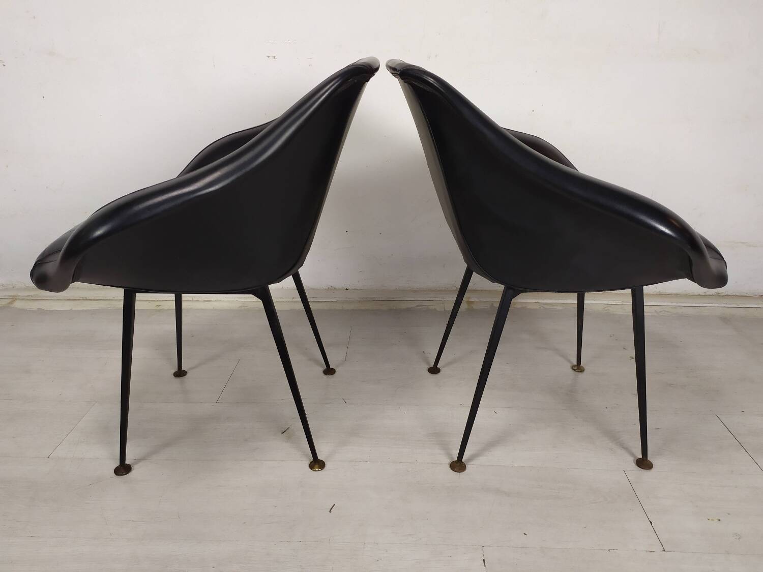 Vintage black skai armchairs