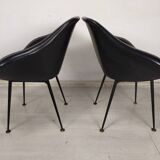 Vintage black skai armchairs