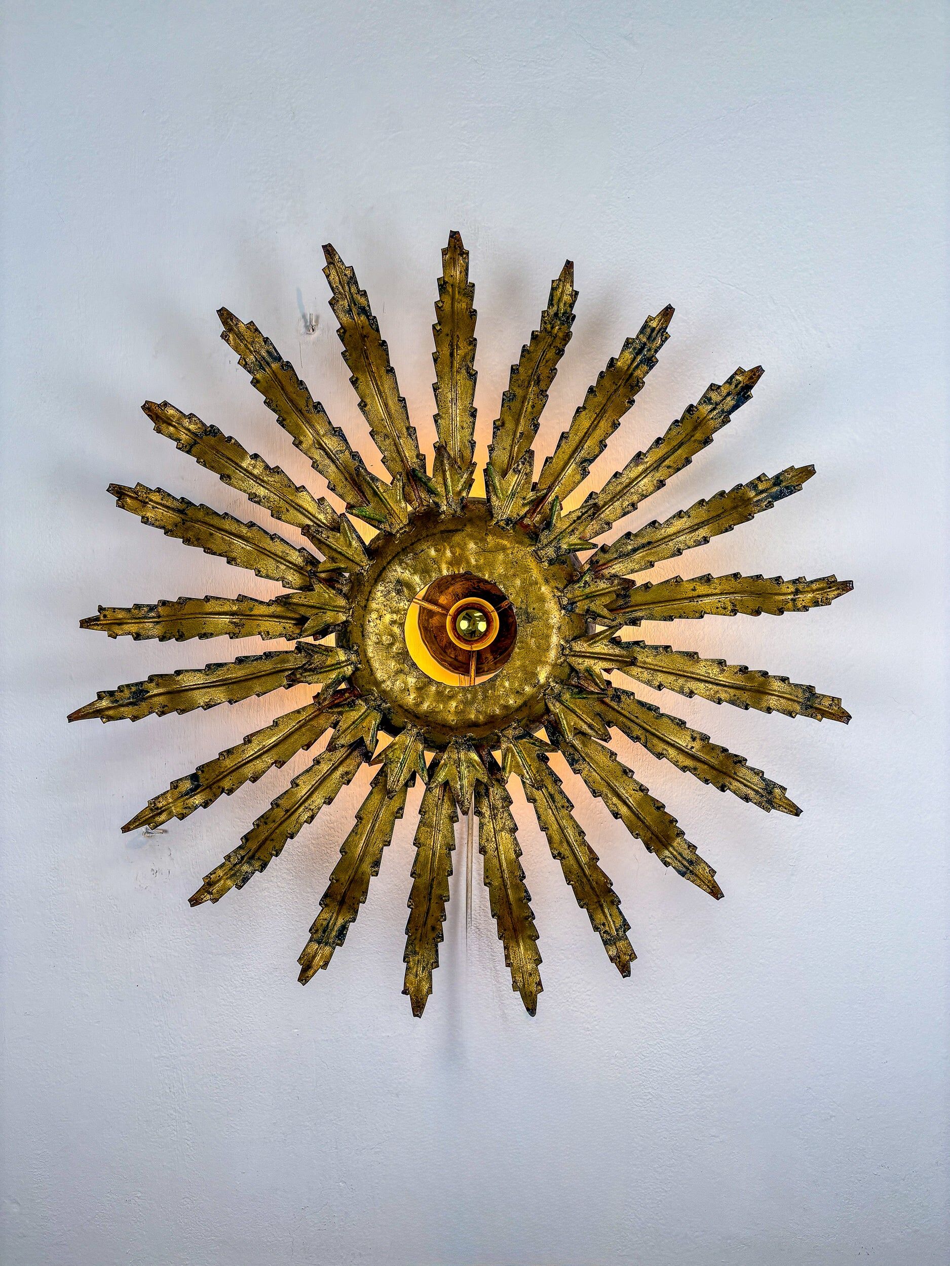 Large French sunburst flower leafed light fixture in gilt metal, 1960s
