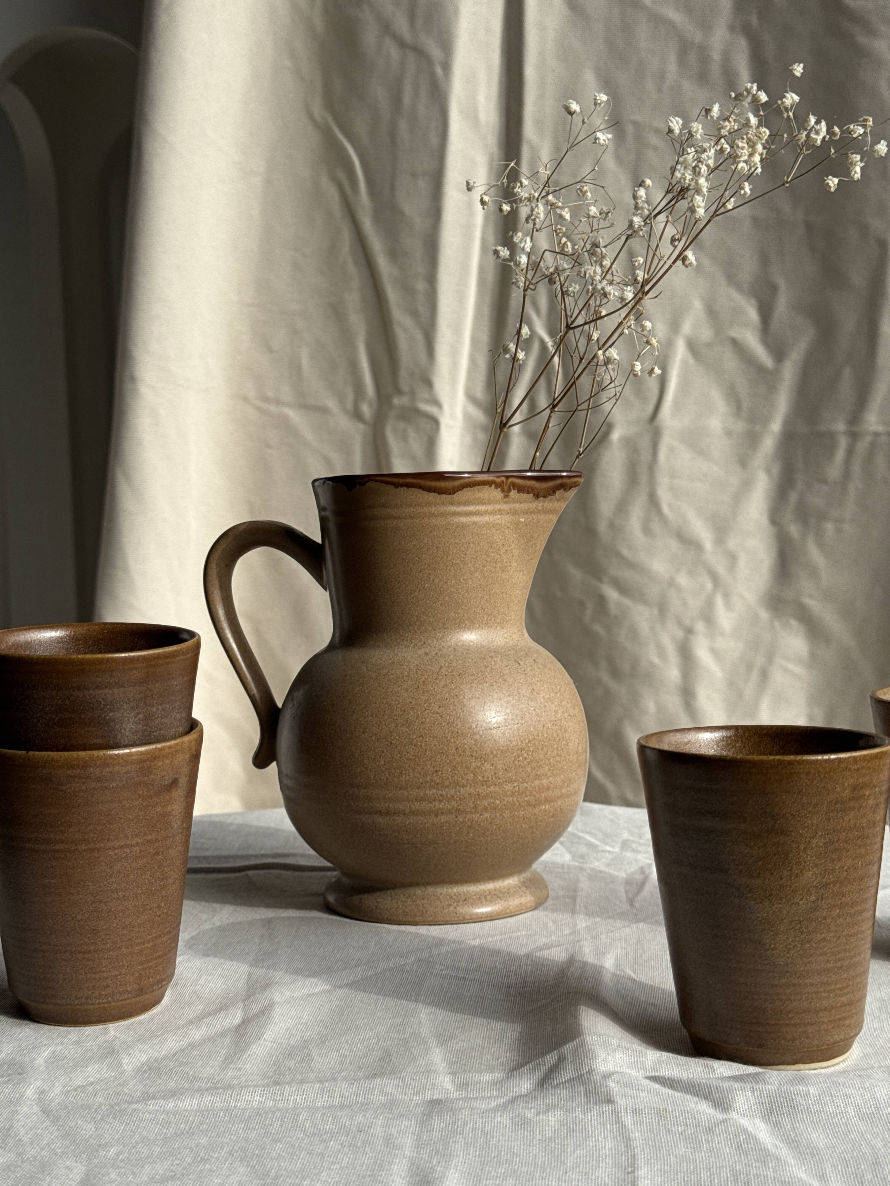 Set of 10 small stoneware mugs from Digoin.