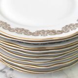 10 white and gold porcelain dinner plates