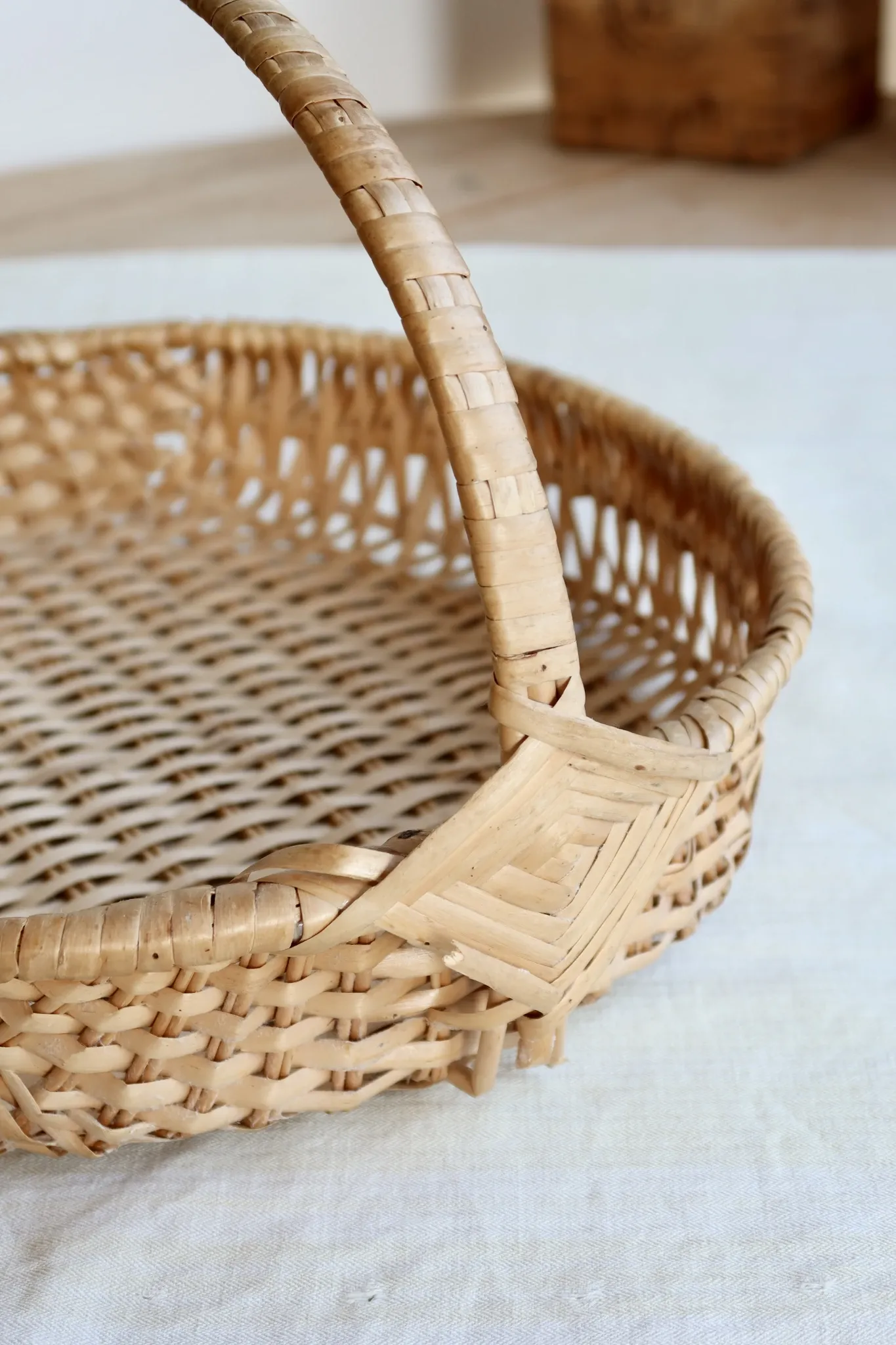 Vintage hand-woven wicker harvest basket