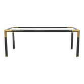 Table basse métal doré pierre à fusil et verre fumé des années 70