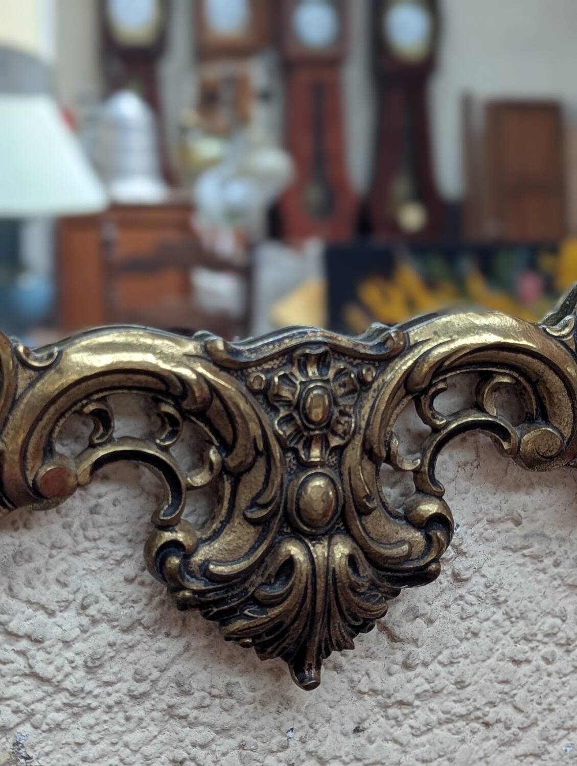 Gold metal wall mirror