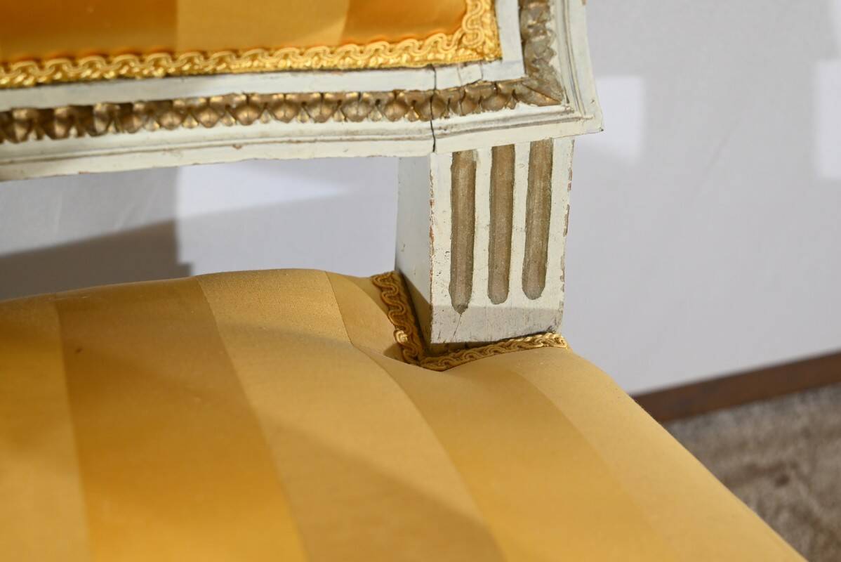 Pair of Cabriolet Armchairs, in rechampi wood, Louis XVI style – Late 19th century