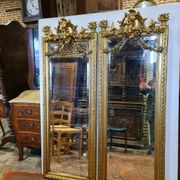 Miroir avec un ange en bois doré et stuc 166x61cm