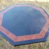 Octagonal table paul michel and its black lacquered chairs and elm magnifying glass