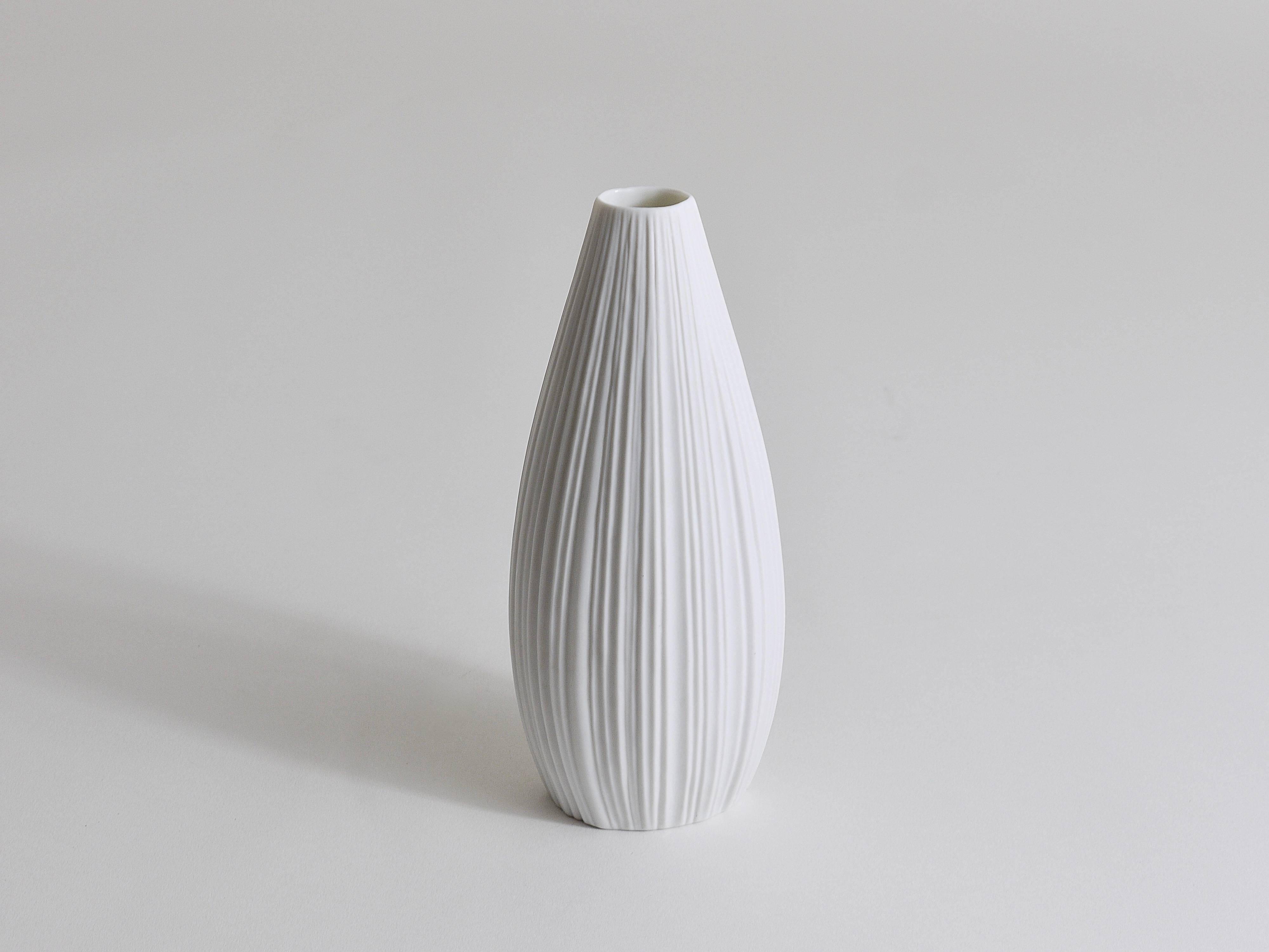 White porcelain vase with striped relief by Rosenthal, designed by Martin Freyer, Germany, 1960s.