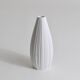 White porcelain vase with striped relief by Rosenthal, designed by Martin Freyer, Germany, 1960s.