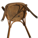 Curved wooden armchair