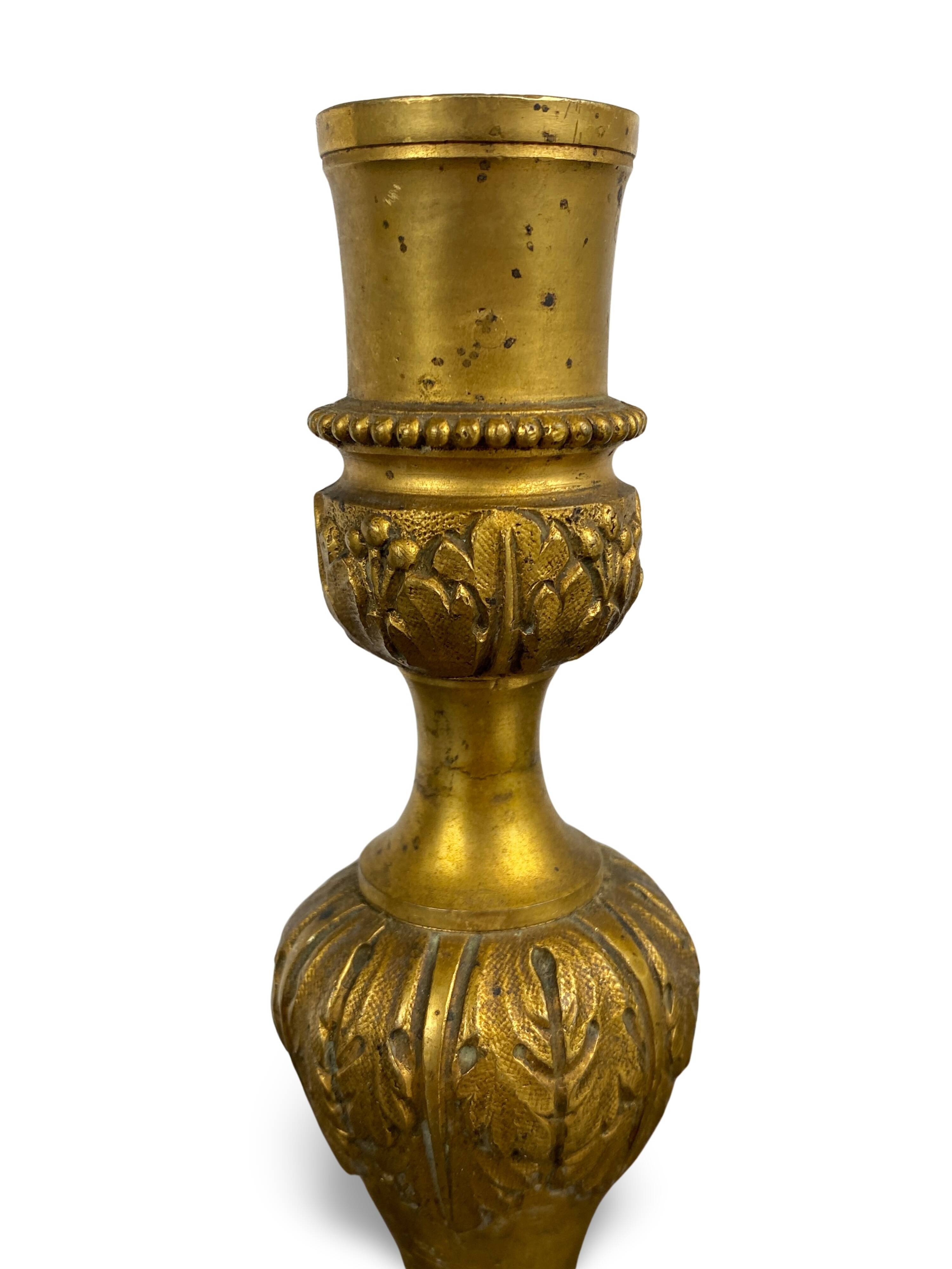 Louis XVI period candlestick in chiseled gilt bronze