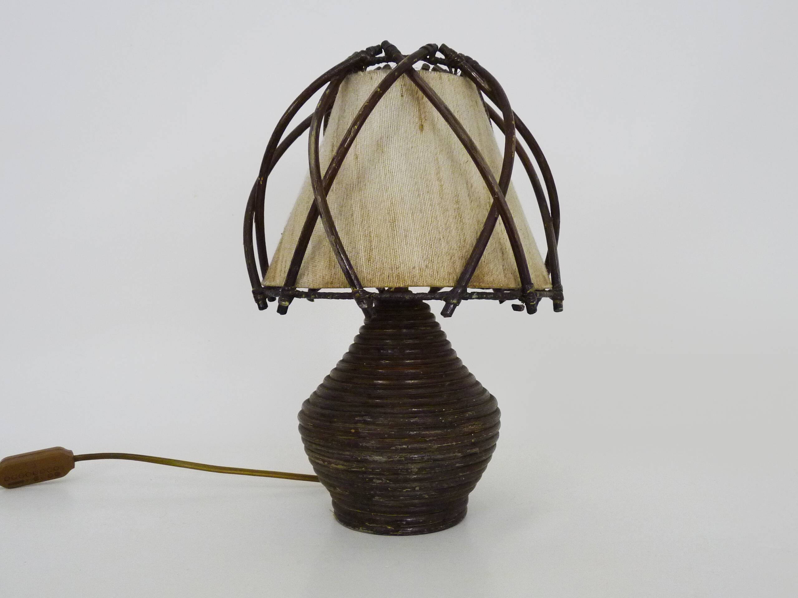 Bedside lamp, table lamp in rattan, bamboo Louis Sognot. 50s