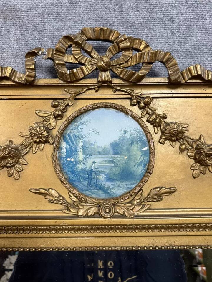 Louis XVI style trumeau mirror in gilded wood, circa 1900