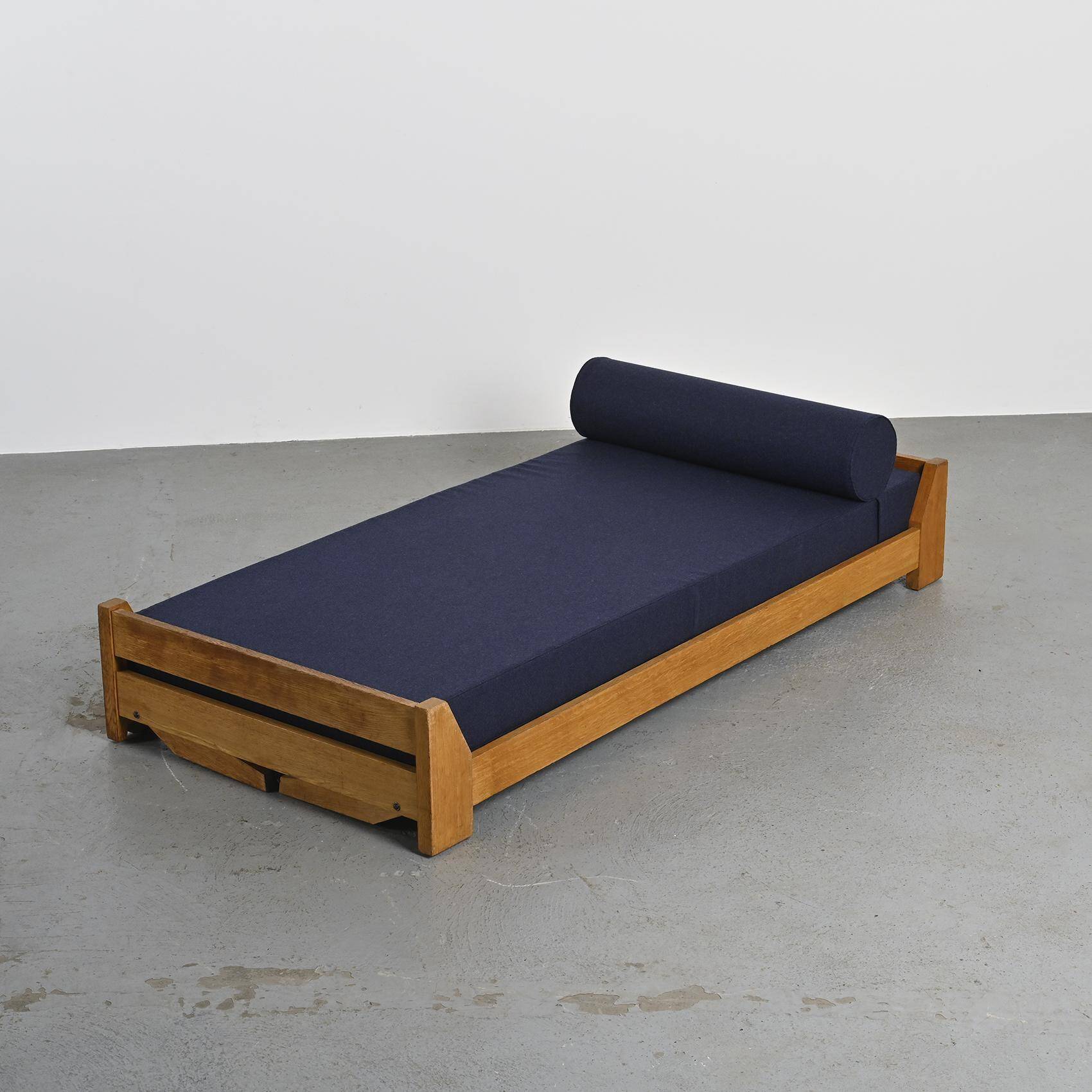 Wooden bench with midnight blue fabric, France, circa 1955