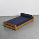 Wooden bench with midnight blue fabric, France, circa 1955