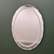 1970s Italian oval mirror by Crystal Arte with faceted glass frame