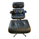 Black leather Eames Vitra armchair, original with rosewood ottoman.