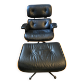 Black leather Eames Vitra armchair, original with rosewood ottoman.