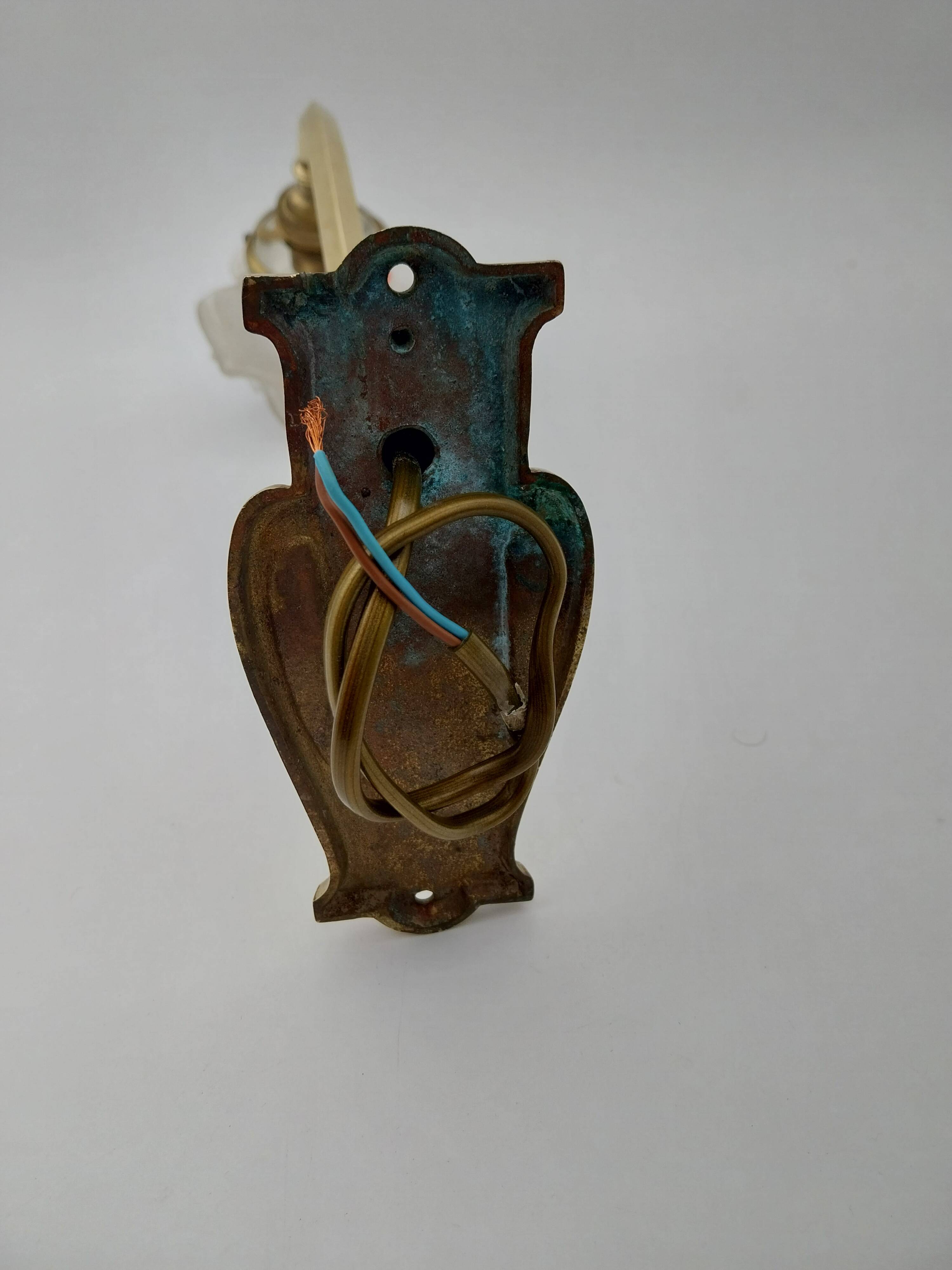 Art Nouveau bronze wall lamp with its rose-shaped glass paste tulip