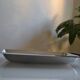 Art Deco serving dish in chrome metal with ebony handles.