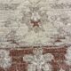 Tapis oriental en laine beige à motif floral