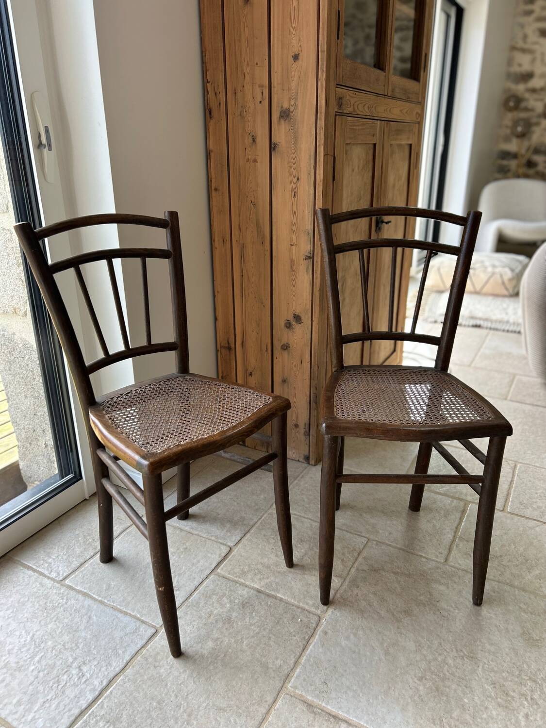 Pair of cane bistro chairs