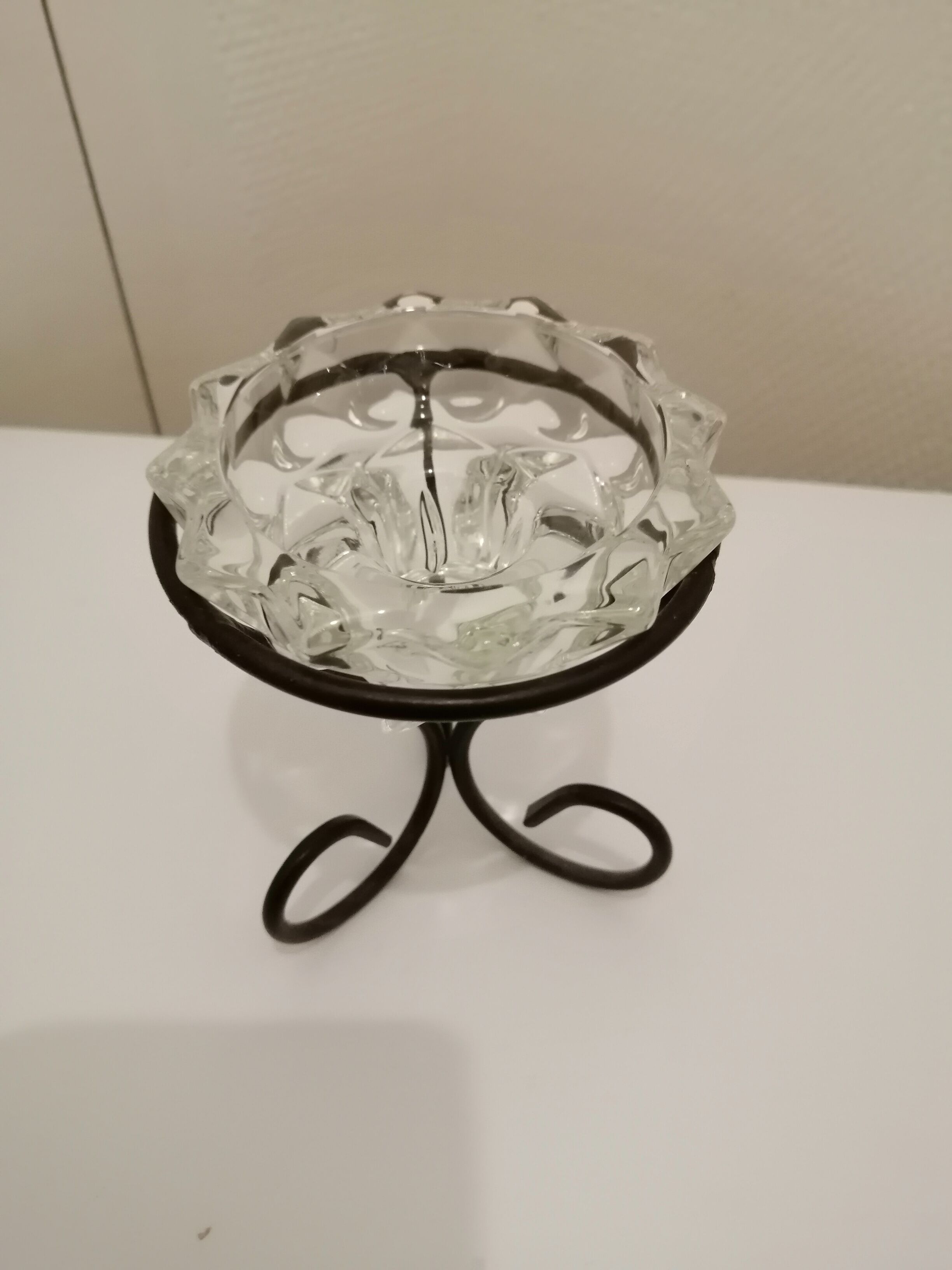 Metal base glass candle holder