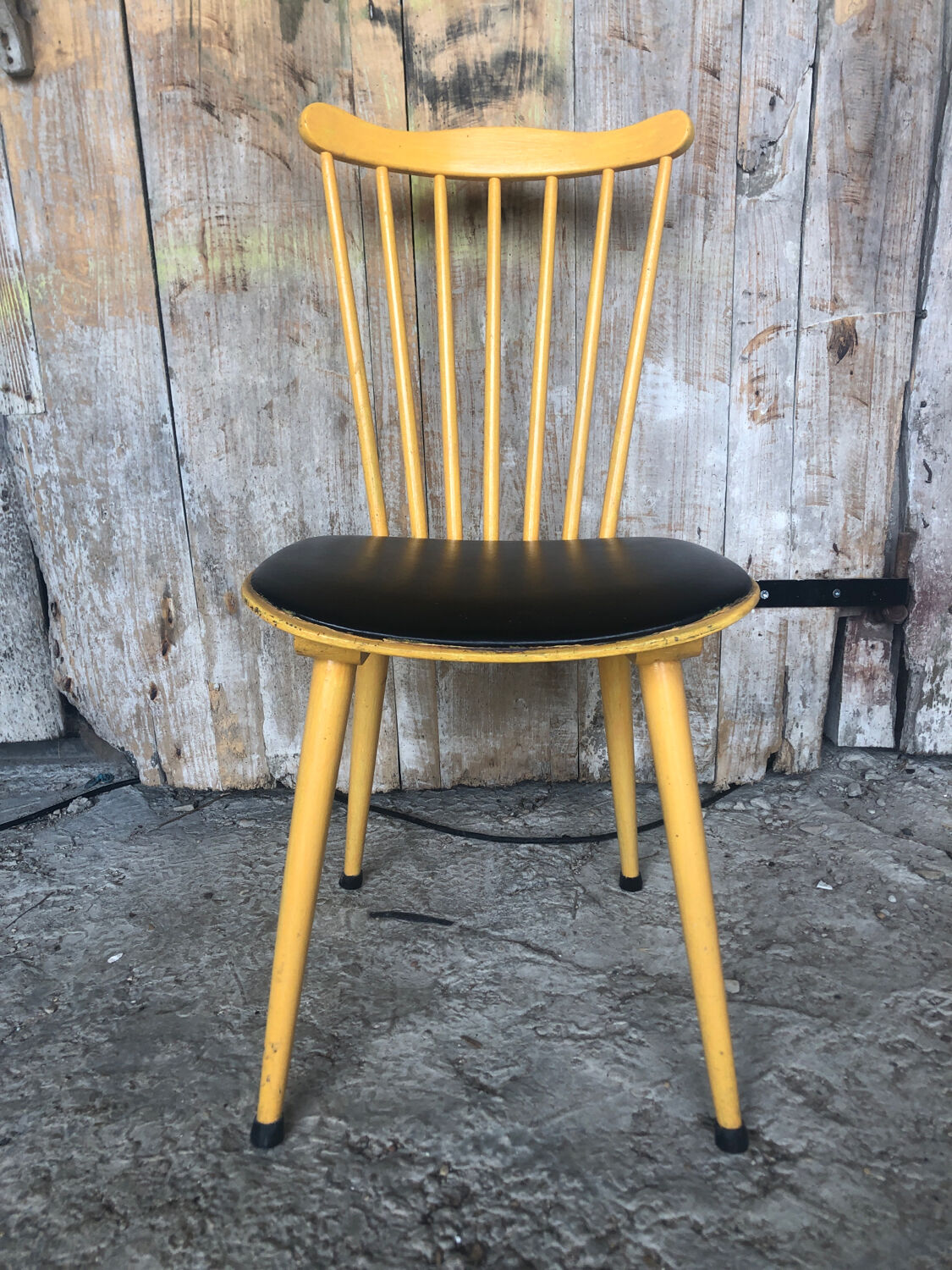 Baumann western style chair in yellow wood + vintage black skai seat