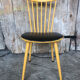Baumann western style chair in yellow wood + vintage black skai seat