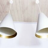 Pair of metal tapered suspensions