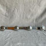 Metal wall coat rack